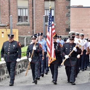 Led by the Everett Fire Department’s Honor Guard, the department marched into the Ferry Street Fire Station to begin the ceremony.