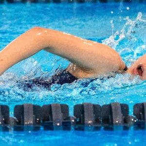 Danielle Harrington swims in the 100 Yard Breaststroke event. (Advocate Photo/Henry Huang)