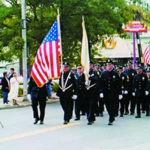 TRIUMPHANT RETURN?: In 2009, Revere held its last Columbus Day parade. Shown above, Christopher Columbus leads the Revere Police Dept. stepping off on Broadway. (Advocate file photo)