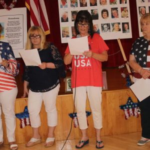 Laurie Davis, Lynda Cerrazzo, Cheryl Roberto and Cathy Strum read departed seniors’ names.