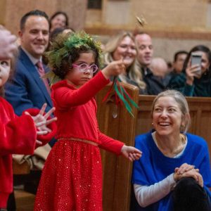 A young concert patron was one of a dozen who used Conductor Robert Lehmann’s “Magical Baton” to lead the Orchestra in excerpts from The Nutcracker.”