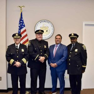 Pictured from left to right: Police Chief Paul Strong, Lieutenant Mark Zielinski, Mayor Carlo DeMaria and Bishop Robert Brown.