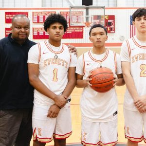 TIDE TEAM LEADERS: EHS Varsity Basketball Head Coach Gerry Boyce with Captains Jevaun Berberena, Tyson Chhun and Henrique Pinto. (Advocate photo)