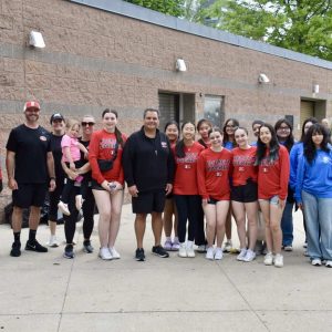 Mayor Carlo DeMaria alongside students in the Key Club and Everett High School Athletics.