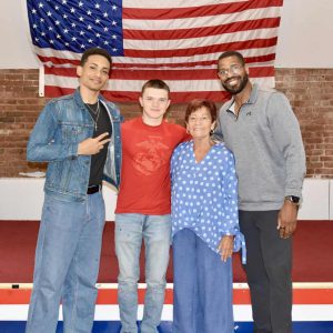 From left: EHS graduates Albert Ferreras (enlisted in the United States Army Reserve) and Cayden Bairos (enlisted in the United State Marine Corps.) alongside City of Everett Veterans Agent Gerri Miranda and Director of Veterans’ Affairs Antoine Coleman.