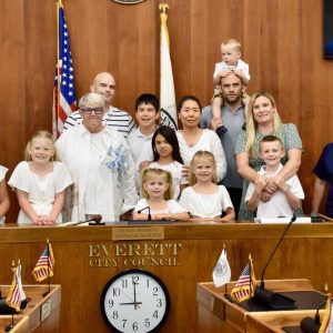 Everett School Committee Vice Chairperson/Ward 3 Member Jeanne Cristiano, great-great-granddaughter of Nellie Zackular, the first woman to register to vote in Everett, and her family at the 105th Anniversary of the 19th Amendment celebration.