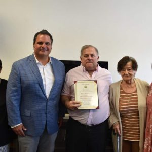 Mayor Carlo DeMaria alongside Rich Sully and his family