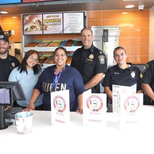 4.	RPD officers meet the staff of the Dandee Donut Factory, from left: Abdepaziz Ibmoueddas, Officer Derek Vecchia, Yerielis Cirino, Manager Jazmin Figueroa, Capt. Thomas Malone, Officer Raisa Builes, and Sgt. Milton Alfaro.