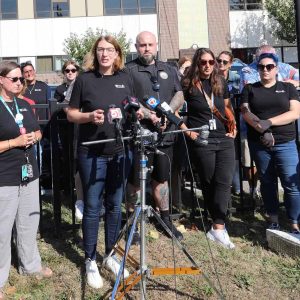 Revere Teachers Association Co-President Jane Chapin is shown addressing the media outside Revere High School on Wednesday. Chapin described the tension at the school between faculty and students following recent incidents. Shown standing alongside Chapin is RTA Co-President Michelle Ervin, City Council President Anthony Cogliandro, Andrea Aeschlimann and Lianna Del Greco. (Advocate photo)