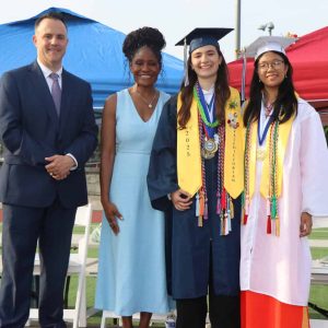 Valedictorian Erta Ismahii, Salutatorian Dayna Phan shown with Mayor Patrick Keefe and CityLab Principal Stacey Mulligan, Ed. D.