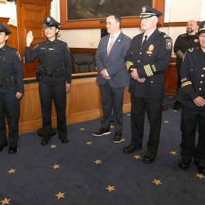 5.	Officers Rivera and Arias take their oaths of office, as Mayor Keefe, Chief Callahan and Capt. Lavita look on.