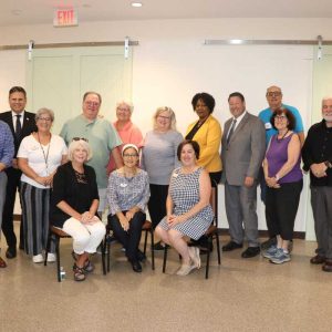 Shown from left to right: Back row: Frank Kelly, Robert Green, Mayor Gary Christenson, Cindy Robillard, Dennis Donnelly, Elizabeth Lombardozzi, Janis Moriarty, Fiona Nattabi, Christopher DiBenedetto, Ward 6 Councillor Stephen Winslow, Marilyn Andrews, David Gardner and Robert Santo; seated: Mary Beth Leon, Gabriella Snyder Stelmack and Patty Kelly.