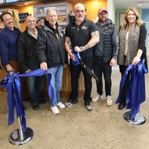 One snip and it’s official, GM Dave Ferrara cuts the ribbon with Mayor Arrigo and guests, State Representative Jessica Giannino, NE Regional School Committee member Anthony Caggiano, Councillor Ira Novoselsky and Dave Pilarski (left) VP of Operations.