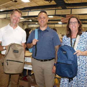 Shown from left to right: Amazon Economic Development Head Jonathan Greeley, Mayor Patrick Keefe and Supt. of Schools Dr. Dianne Kelly.