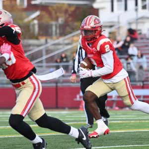 Tide junior running back Jamauri Dulin. Shown in recent action against Lynn English, scored four of the team’s five rushing touchdowns against Cambridge.   (Advocate photo by Emily Harney)
