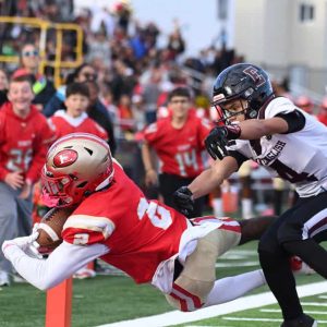 Everett’s Jamauri Dulan attempts to get the ball in the endzone as a Lynn English defender moves in.  (Advocate photos by Emily Harney)