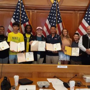 The Revere City Council recently awarded Certificates of Commendation to Revere High School track athletes JV Cunha, Kenny Guerrero, Ricardo Goncalves and Mark Marchese for qualifying for and competing in the Nike Outdoor Nationals at the University of Oregon. Additionally, coaches Samnang Ros, Raquel MacDonald, Brian Scata and Sean Conboy were recognized for their guidance and leadership throughout the process. The motion was presented by Ward 3 Councillor Anthony Cogliandro. (Advocate photo by Adam Swift)