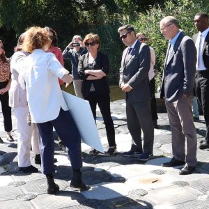 Seeing is believing: EEA Secretary Rebecca Tepper, Mayor Gary Christenson and State Senator Jason Lewis and others accessed the floating dock and the riverbank firsthand.