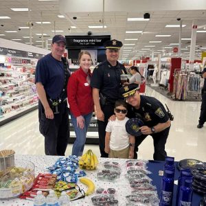 Everett Police Chief Paul Strong, members of the Command Staff, Police Officers Raoul Goncalves and  Sandra Rivas, along with Meagan Gokas of Target Loss Prevention, welcomed shoppers with complimentary coffee, snacks, and police giveaways.
