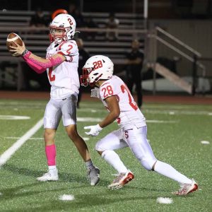 Sachems QB Jordan Rodrigues hands off to running back Pablo DeJesus in action against Winthrop.  (Advocate file photo)