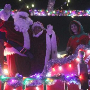 Santa, Mrs. Claus and Buddy the Elf wished everyone a Merry Christmas.