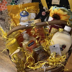 A CONTEST FOR VIRTUAL VISITORS: Fans of bestselling author Laurie King, who wrote the Mary Russell & Sherlock Holmes series, will get to have a virtual visit with her on Oct. 7 from 7 to 8 p.m. via Zoom. They must register at the Saugus Public Library. Every attendee will be entered to win this Beekeeper's Apprentice Gift Basket. Please see “Author Laurie King’s virtual visit on Oct. 7” in this week’s column for details. (Courtesy Photo to The Saugus Advocate)