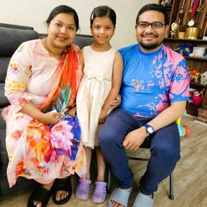A DAY WORTH CELEBRATING: Sabbir Sakib (right) has a fresh outlook on life and a new heart as he looks forward to Father’s Day (Sunday, June 21). Joining him in the living room of their Saugus home are his wife, Sadia Binta Jamil, and their daughter, Sabrin, 6. (Saugus Advocate Photo by Mark E. Vogler)