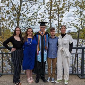 A FAMILY THAT VALUES EDUCATION: the Whitcomb quadruplets with their mom at last weekend’s UMass Lowell Commencement Exercises. Pictured from left to right: Collette, Maureen, Andrew, Bryce and Diana celebrated Andrew’s graduation. (Courtesy photo to The Saugus Advocate)