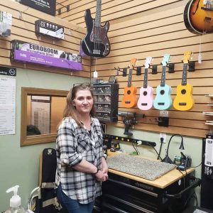 A federal Cliftondale Revitalization grant spurred happy notes and hope for Maria Broufas at Play Music, her Lincoln Avenue music shop, in January. (Saugus Advocate Photo by Mark E. Vogler)