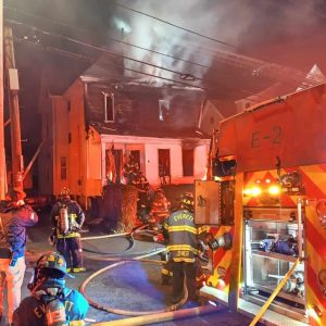 Everett fire fighters responded to a house fire at 132 Walnut St. before midnight Tuesday evening as they battled heavy fire conditions which caused a second alarm to be struck. No injuries were reported and the fire is under investigation.  (Photos by Michael Layhe)