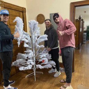 ASSEMBLING THE TREE: Left to right: Loranzo Keegan, Tommy Jarosz and Zackery Kahn volunteered to prepare this artificial tree to honor the late Medal of Honor recipient Staff Sergeant Arthur F. DeFranzo at the MEG Foundation’s upcoming 2024 Christmas Tree Festival. (Courtesy photo to The Saugus Advocate)