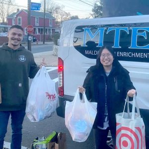 Jacob and Stephanie from MTEC are shown making their holiday deliveries.