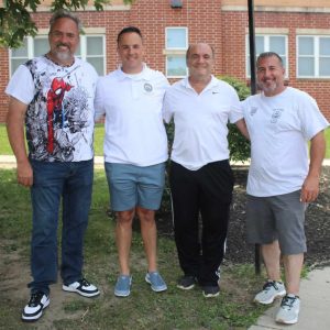 Mayor Patrick Keefe is shown with city officials, from left to right: Ward 4 City Councillor Paul Argenzio, Mayor Keefe, School Committee member Anthony Caggiano, and Parks Supervisor Nick Sevastakis at the A.C. Whelan Elementary School grounds.