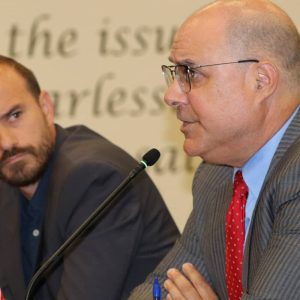 IN HAPPIER DAYS: City Clerk Sergio Cornelio listens to his former attorney John Tocci during his reappointment before the City Council in July 2022. Atty. Tocci has requested to be removed as Cornelio’s lawyer during his ongoing defamation lawsuit with the mayor.  (Advocate file photo)