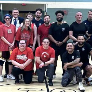 BEEBE BASKETBALL: Here are all the participants in the game Tuesday night, the Malden Police All-Stars on the right and the Beebe K-8 School All-Stars on the left. Center, back row, is Superintendent of Schools Timothy Sippel. (Courtesy/Katie Bowdridge)