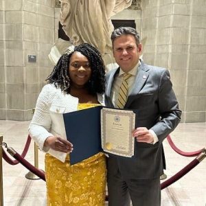 Mayor Gary Christenson presented Scune Carrington with a Citation from the City of Malden in honor of her achievement for receiving the Boston College School of Social Work’s Equity, Justice and Inclusion Distinguished Alumni Award. (Courtesy of the City of Malden)
