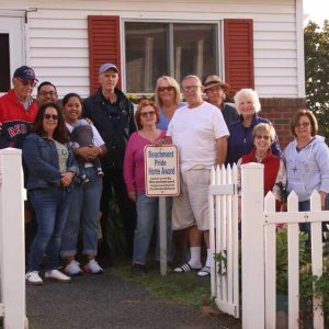Pictured from left to right: Back row: Tom Turner, Victor Monterroso, Tom Wilson, Mary Turner, David Gregory and Kathleen Heiser; front row: Nicole Deveau, Jacquelin Monterroso (and son Nicholas), homeowners Barbara and Beverly Sheets, Carol Tye and Corinne Deveau.