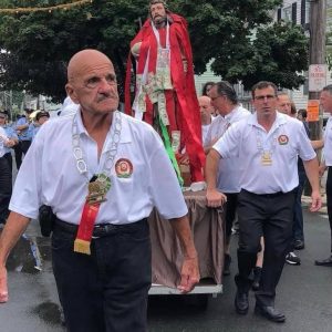 Butch Gennetti and Anthony Spadafora escort Saint Rocco during the Sunday afternoon Procession.