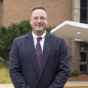 Richard M. Barden, who has been appointed to be the next Principal of Northeast Metro Tech, stands outside of the school. (Courtesy Northeast Metro Tech)