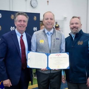 Pictured from left to right: MC President John K. Thornburg, awardee Jared Belliveau ’97 and MC Principal Jeffrey P. Smith ’95. (Photo Credit: James Black)