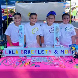 Belmonte STEAM Academy fifth-graders Layla Najem, Ava Najem, Lily Gerow and Amelia Clark made custom bracelets and sold them at Founders Day to raise money to support Boston Children’s Hospital. (Courtesy Photo to The Saugus Advocate)