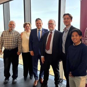 Pictured from left to right: Doug and Mary Ann Boari, son-in-law and daughter of William Dempsey; Mayor Gary Christenson; Norvin Leach, son of Ralph Leach; and Thayer and Finn Leach, grandsons of Norvin Leach.