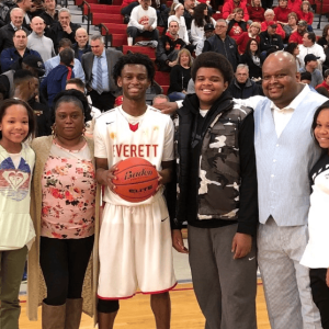 In 2018, during happier times, Everett High School boys basketball player Ghared Boyce, third, left, poses with his family after eclipsing 2,000 career points. They are, from left, Gerniah Boyce, Ghared’s sister, who is on this year’s EHS girls basketball team; Ghared’s mom Lalita C. Davis; Ghared, currently a senior at UMass / Dartmouth; Ghustin Boyce, Ghared’s brother; Gerard Boyce, Ghared’s dad and current EHS boys basketball coach; and Gitalia Boyce, Ghared’s sister. Lalita C. Davis, Ghared’s mom, passed away last week on Jan. 8. (Courtesy photo)