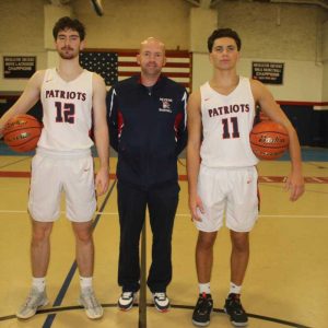 RHS Patriots Co-Captain Luke Ellis (at left), Head Coach David Leary and Co-Captain Andrew Leone
