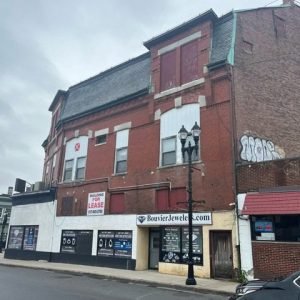 STUCK IN COUNCIL: The dilapidated Bouvier Building in Everett Square will continue to sit in decay after city councillors voted down for a third time, borrowing $3 million to improve Everett Square. (Advocate photo)