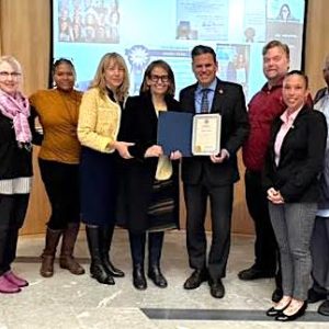 CONGRATULATIONS: The Malden School Committee and Malden Public Schools Superintendent Dr. Ligia Noriega-Murphy congratulated Assistant Superintendent Emilys Peña for her receipt of two major honors recently. Above, pictured from left to right, are School Committee members Elizabeth Hortie (Ward 5), Sharyn Rose Zeiberg (Ward 8) and Dawn Macklin (Ward 4) Supt. Noriega-Murphy, Assistant Supt. Peña, School Committee Chairperson/Mayor Gary Christenson and School Committee members Keith Bernard (Ward 7), Jennifer Spadafora (Ward 3, Vice Chair), Joseph Gray (Ward 6) and Robert McCarthy Jr. (Ward 2). (Advocate Photo)