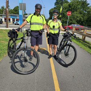 COPS ON BIKES: Saugus Police Officers Billy Cash and Alison Cooper got some exercise on Monday (Aug. 5) while making the rounds on the Saugus segment of the Northern Strand Community Trail. (Saugus Advocate photo by Mark E. Vogler)