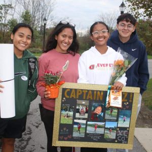 Cross-country seniors, shown from left to right: Harry Jaikaran, Camille Camilo, Co-Captain Suzanne Maharjan, Co-Captain Nischal Tamang and Dawens Germain during Wednesday’s Senior Night at Rivergreen Park.