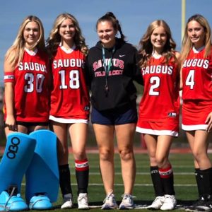 Saugus High Sachems field hockey captains and coach, pictured from left to right: Jordyn Ripley-Deminski, Sydney Ferreira, Coach Julie Champigny, Audrey Comeau and Anna Enwright.