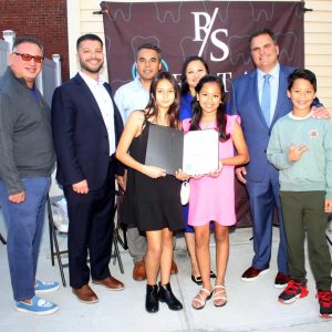 Mayor Carlo DeMaria presented a citation to the owners of RS Dental to commemorate the grand opening of their Everett office. Shown from left to right: Back row: local businessowner Rocco Luongo, Ward 3 Councillor Anthony DiPierro, Office Manager Deep Rana, Lead Dentist Garima Rana, DMD, and Mayor Carlo DeMaria; front row: niece Rayna Lootens, daughter, Gia Rana, 9, and son, Aidan Rana, 9.